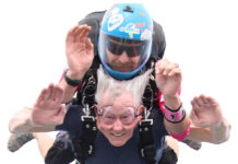 50 years after jet ejection, veteran marks survival with skydiving leap